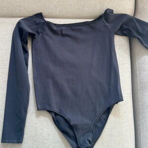 Skims off the shoulder bodysuit